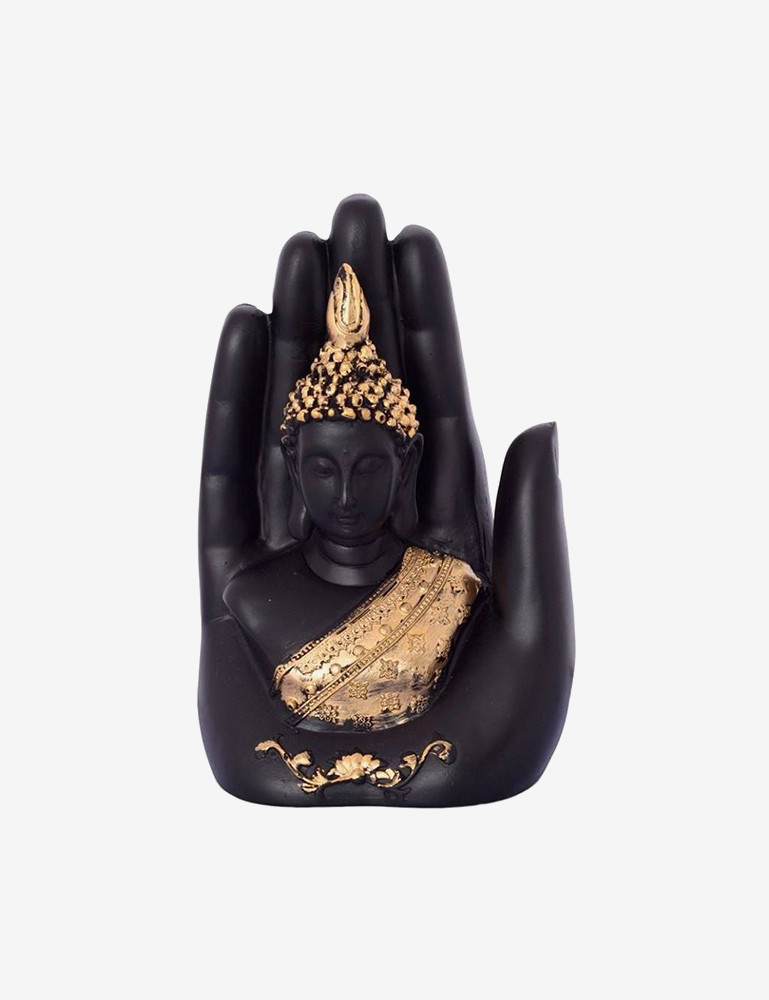 Buddha idol in hand